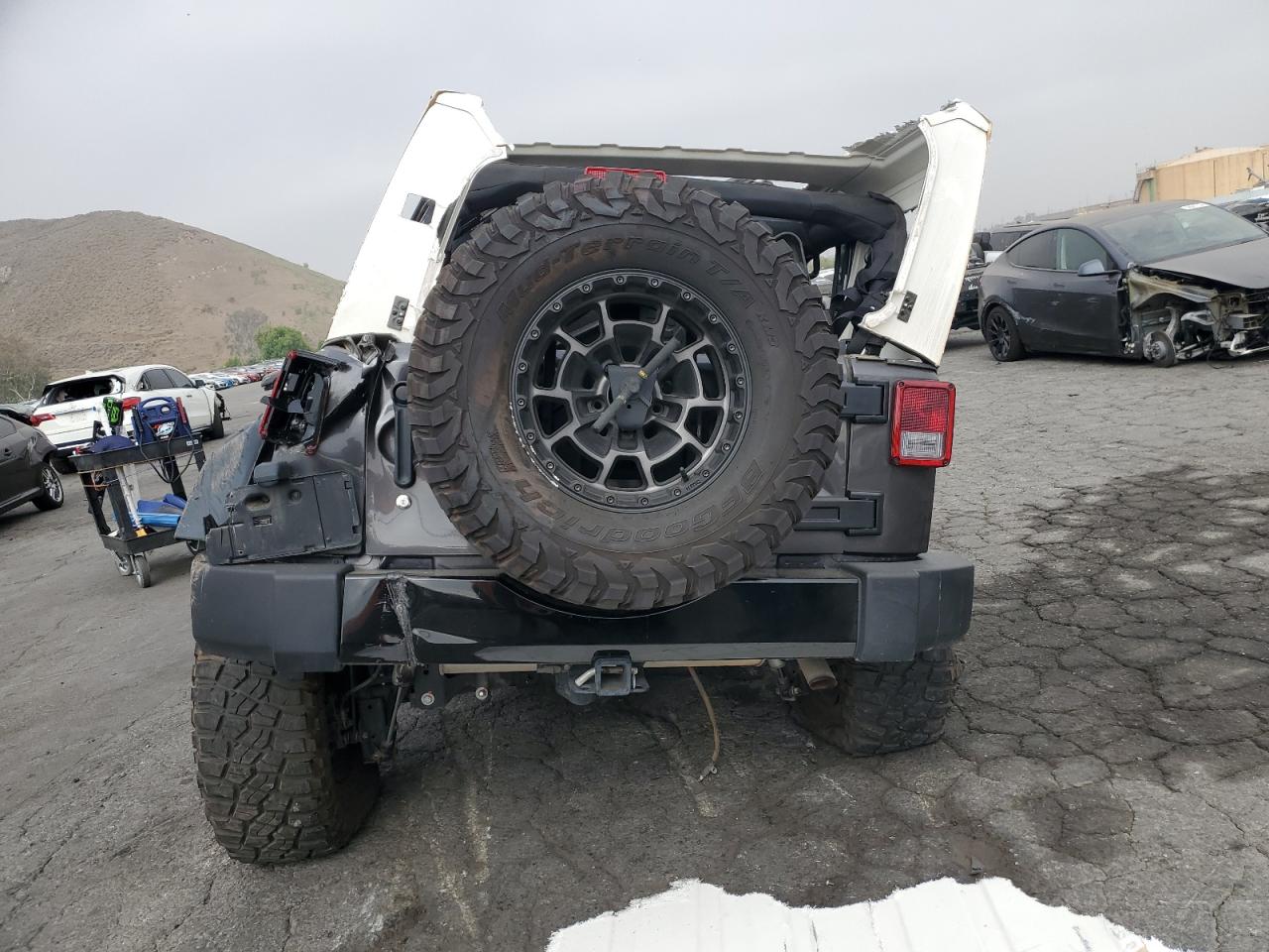 1C4BJWFG1EL167907 2014 Jeep Wrangler Unlimited Rubicon