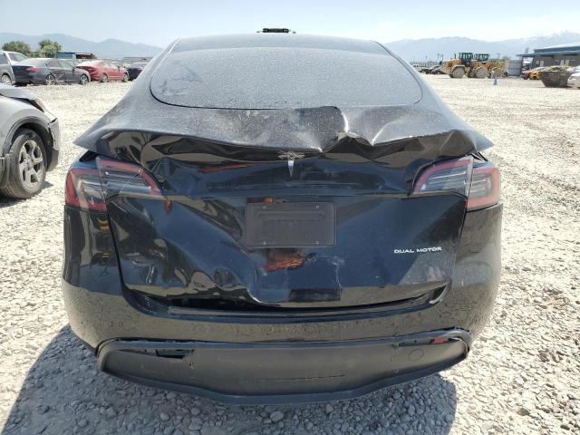 2023 Tesla Model Y VIN: 7SAYGDEE8PF874346 Lot: 58708584