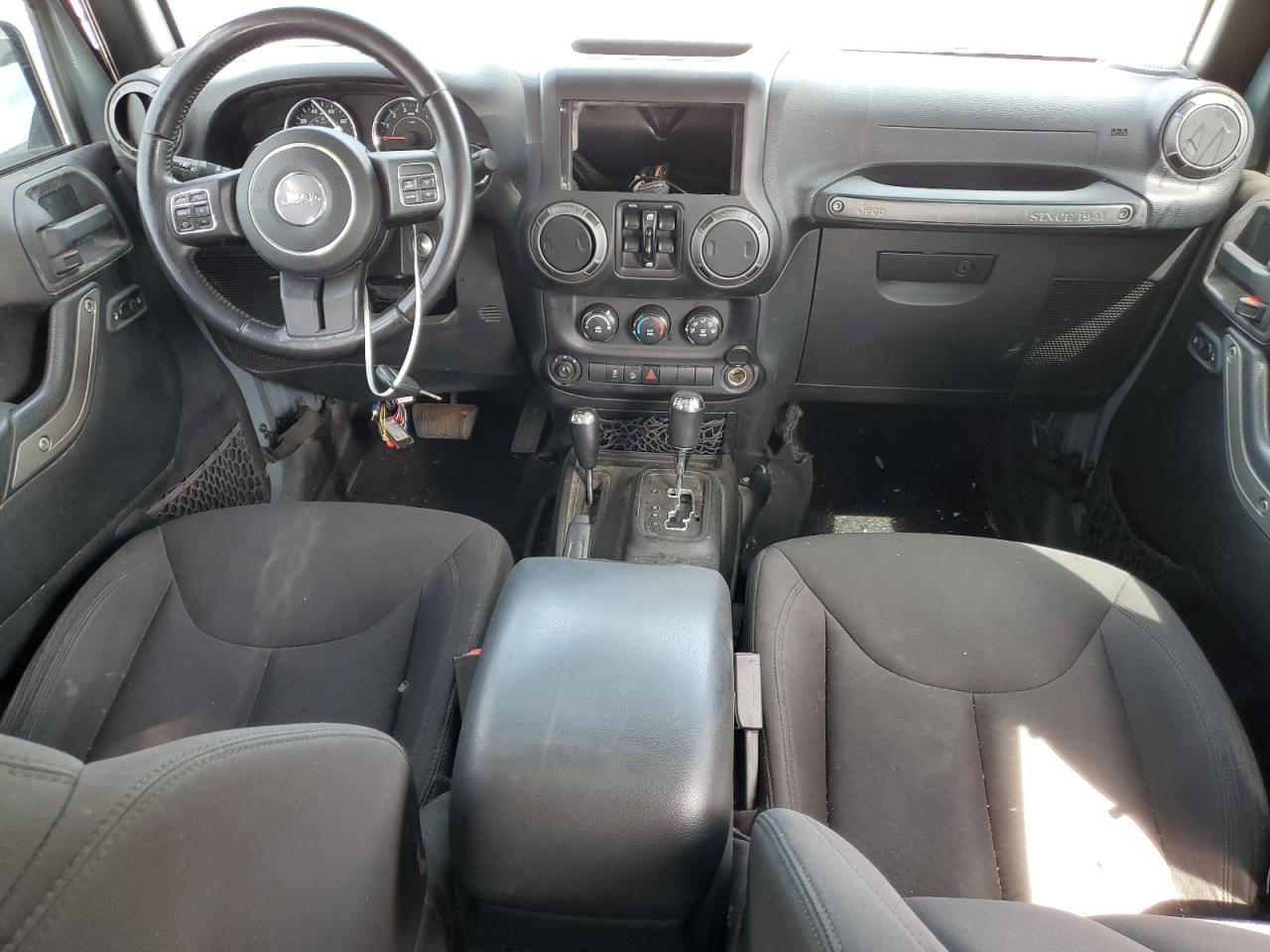 1C4BJWDG1FL773583 2015 Jeep Wrangler Unlimited Sport