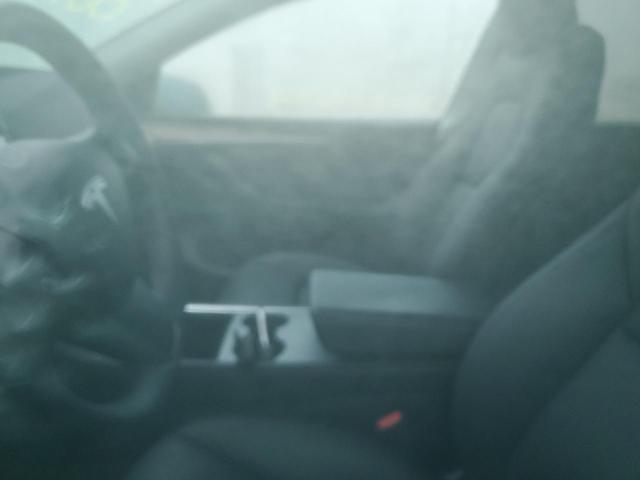 2023 Tesla Model Y VIN: 7SAYGAEE1PF894520 Lot: 57692674