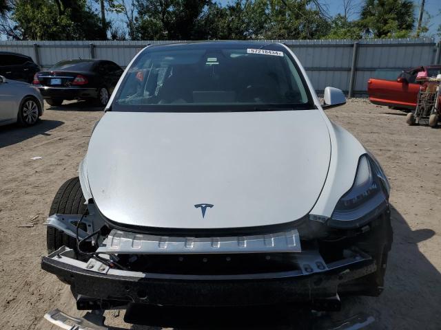 2023 Tesla Model Y VIN: 7SAYGDEE1PA068653 Lot: 57218434