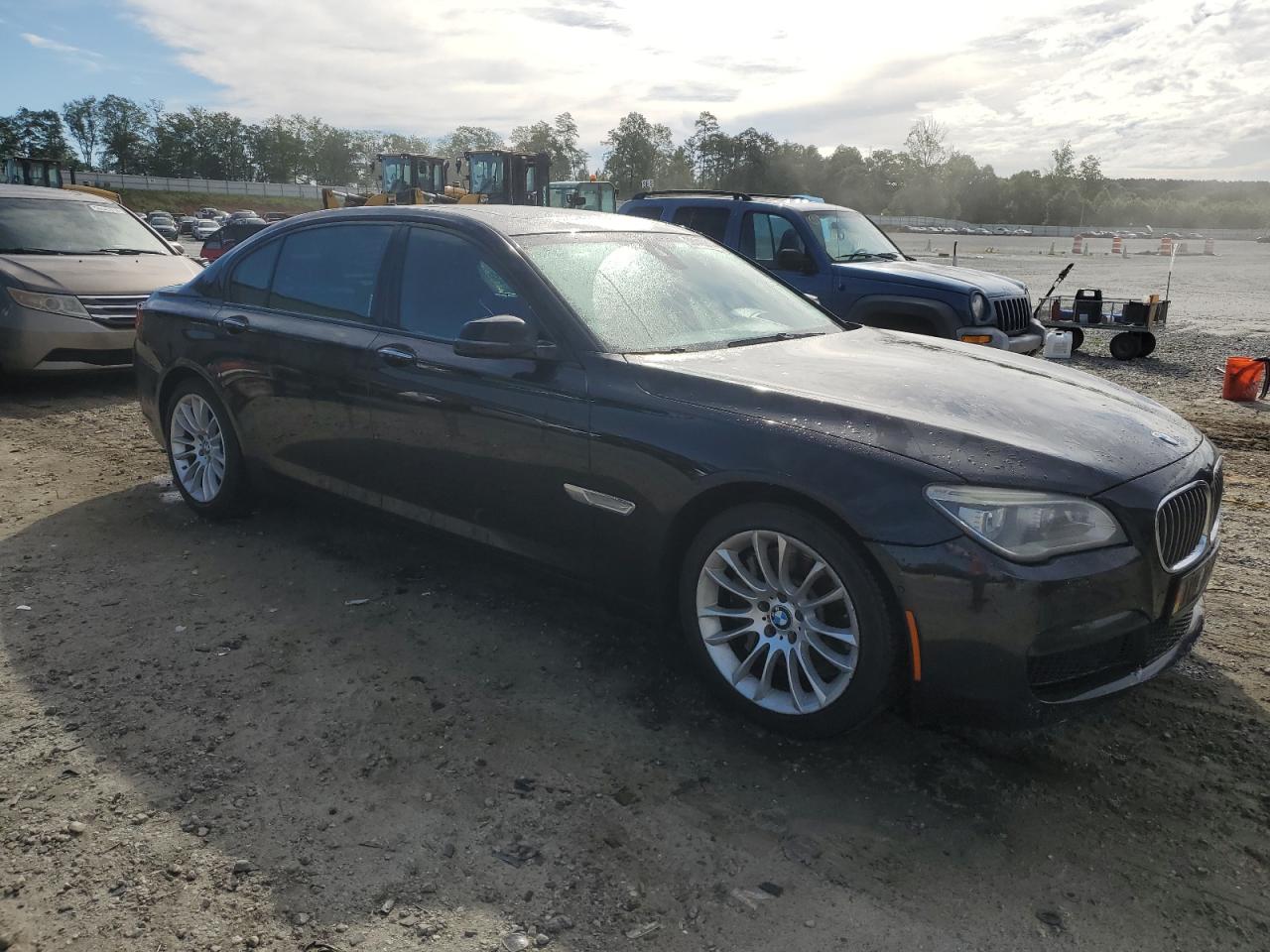 2014 BMW 750 Lxi vin: WBAYF8C58ED142536