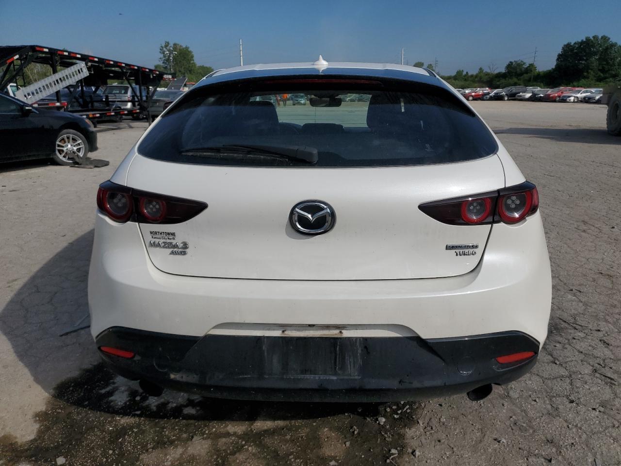 2021 Mazda 3 vin: JM1BPBJYXM1344021