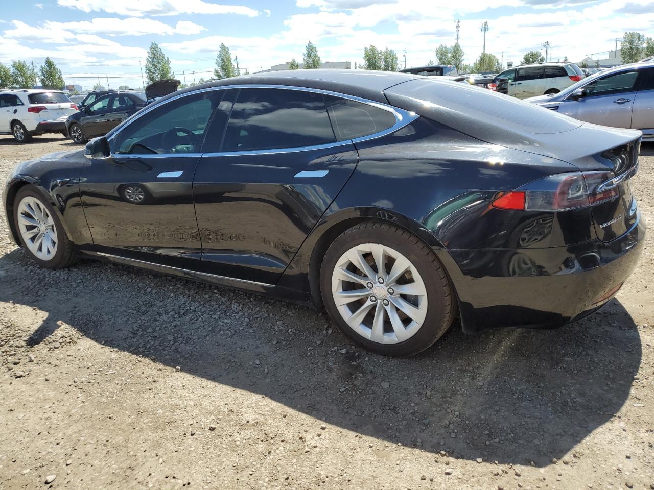 2016 Tesla Model S vin: 5YJSA1E23GF176008