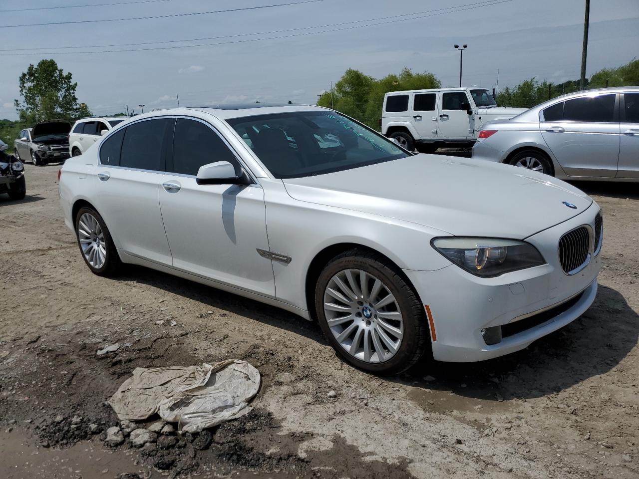 WBAKC6C53CC396306 2012 BMW 750 Xi