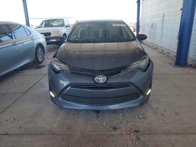 VIN 5YFBURHE0HP676029 2017 Toyota Corolla, L no.5