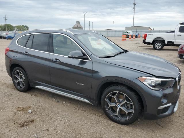 2018 BMW X1 xDrive28I VIN: WBXHT3C37J5F93142 Lot: 57504194