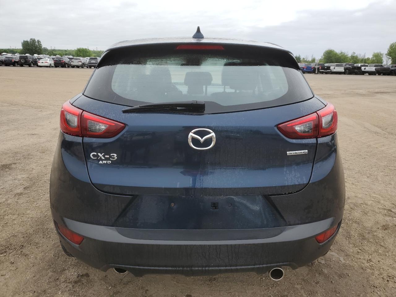 JM1DKFC77M1508506 2021 Mazda Cx-3 Touring