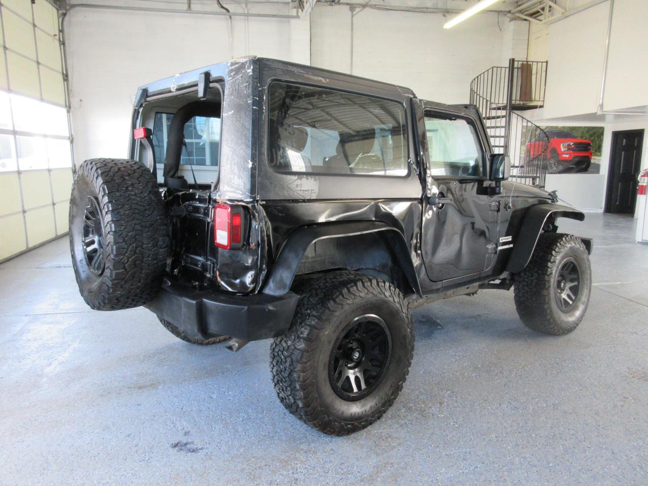 1C4AJWAG0CL181071 2012 Jeep Wrangler Sport