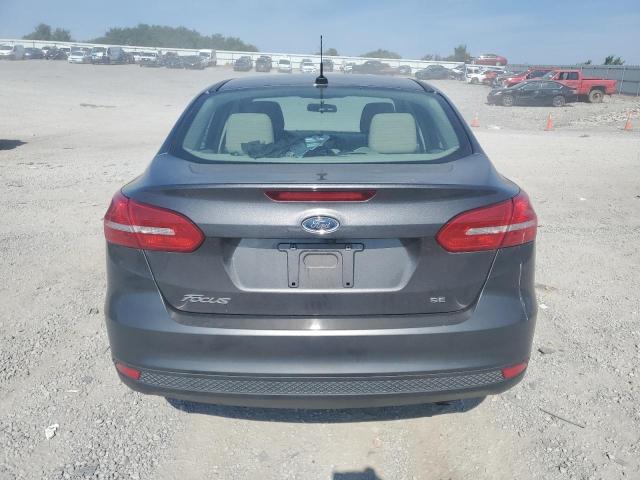 2018 Ford Focus Se VIN: 1FADP3F23JL243024 Lot: 59310034