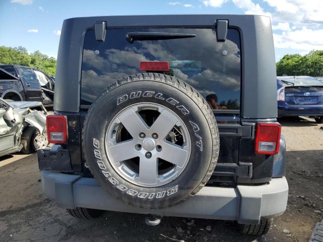2007 Jeep Wrangler Sahara VIN: 1J8GA59197L156608 Lot: 61077084