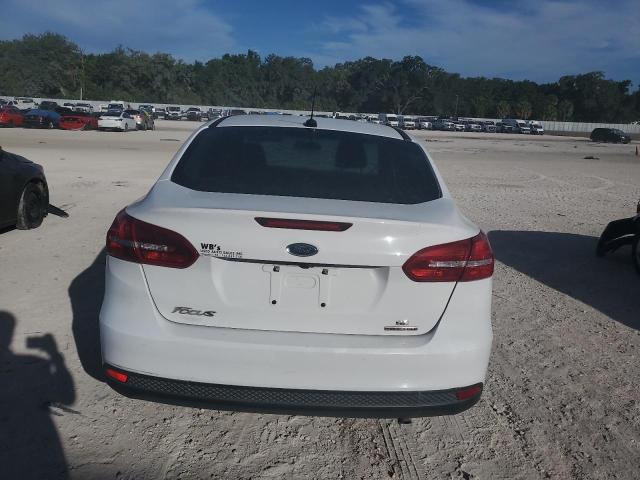 2015 Ford Focus Se VIN: 1FADP3F29FL210357 Lot: 58649544