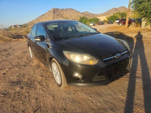 2013 Ford Focus Titanium VIN: 1FADP3J27DL282839 Lot: 58181694