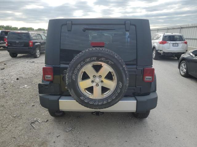 2009 Jeep Wrangler Unlimited Sahara VIN: 1J4GA59139L706227 Lot: 58869224