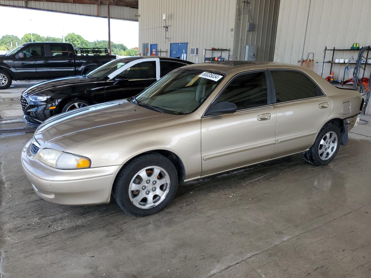 1YVGF22D7X5870232 1999 Mazda 626 Es