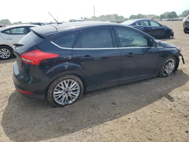 2016 Ford Focus Titanium VIN: 1FADP3N25GL330062 Lot: 57326594