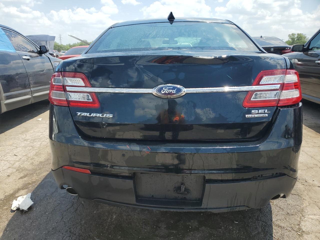 1FAHP2E89EG117203 2014 Ford Taurus Sel