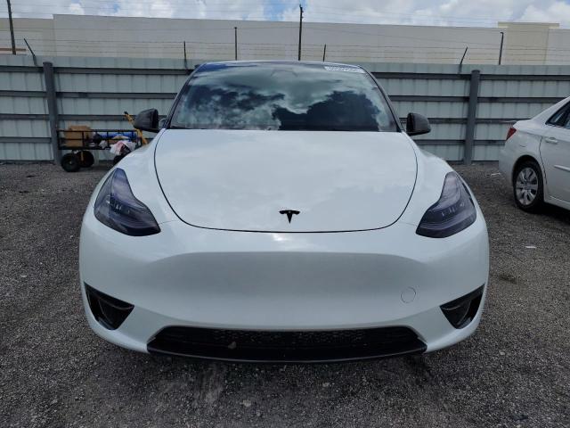 2023 Tesla Model Y VIN: 7SAYGAEE7PF593699 Lot: 60509584