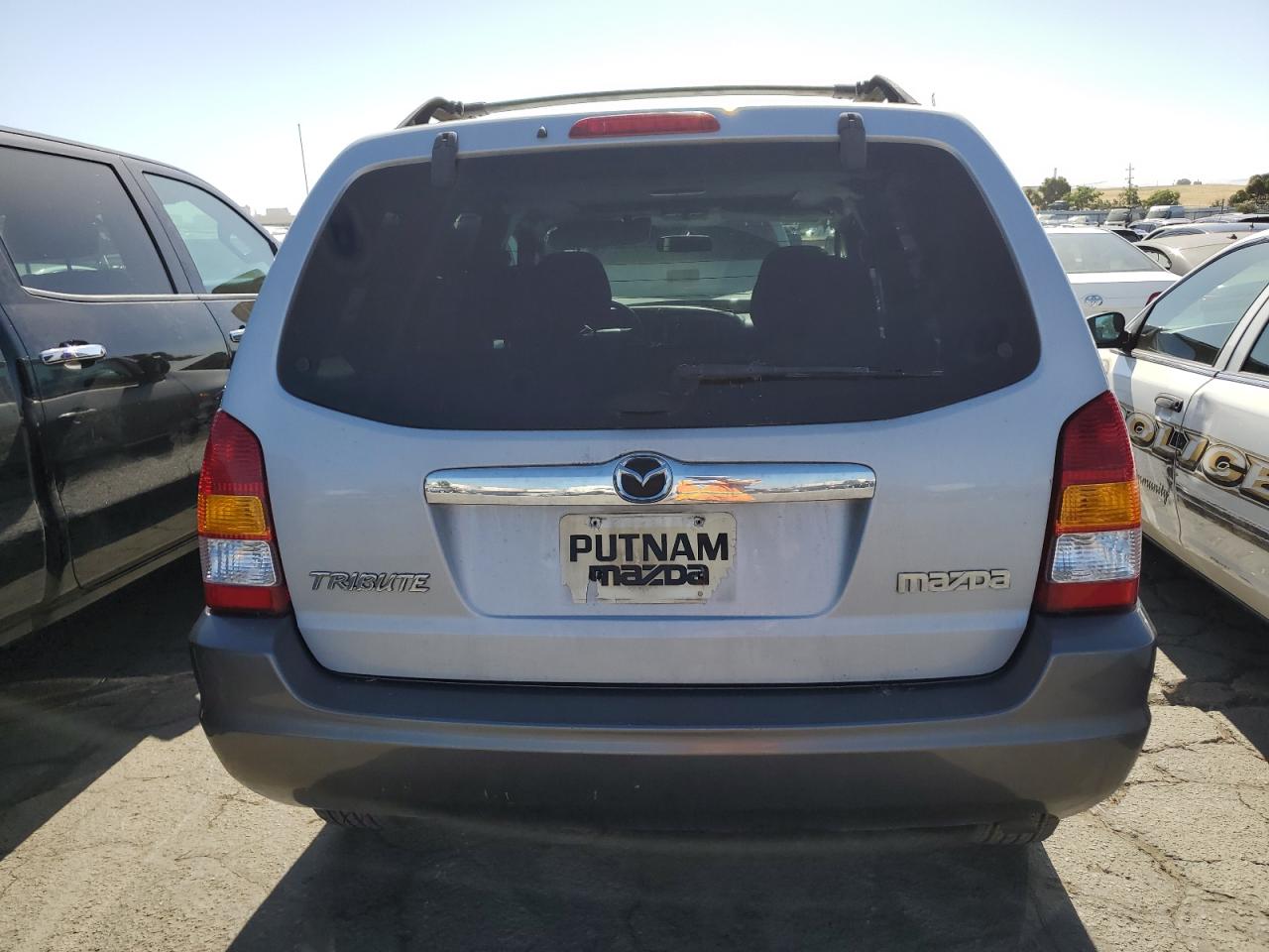 4F2YZ04134KM31437 2004 Mazda Tribute Lx