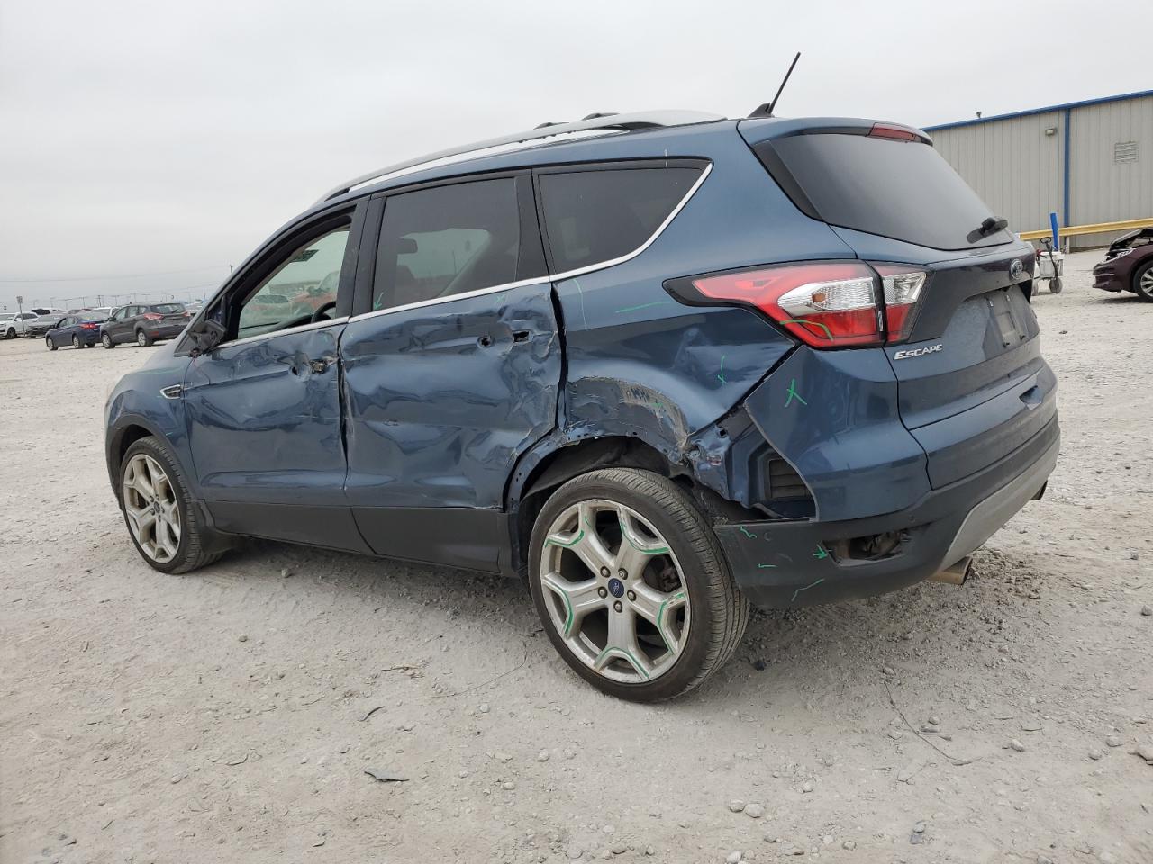 1FMCU0J99JUB05916 2018 Ford Escape Titanium