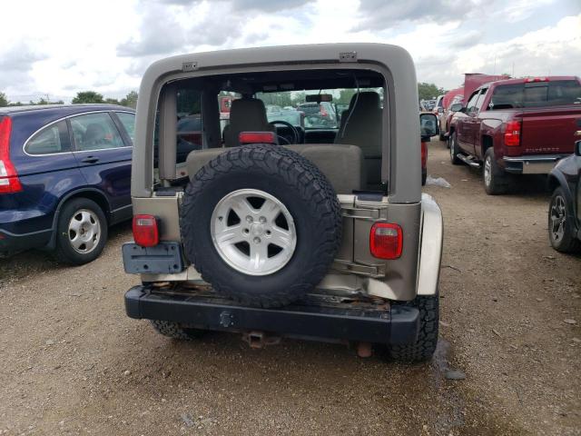 2004 Jeep Wrangler / Tj Sahara VIN: 1J4FA59S14P717944 Lot: 58414144