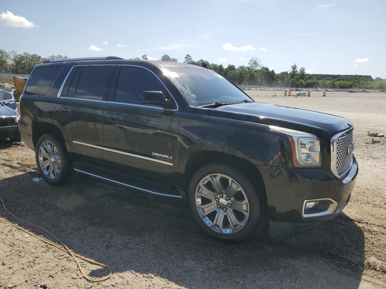 2016 GMC Yukon Denali vin: 1GKS1CKJ4GR380497