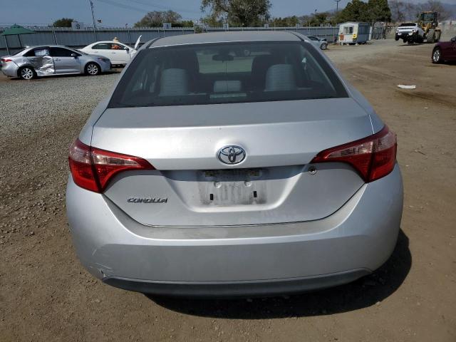 2018 Toyota Corolla L VIN: 5YFBURHE0JP754749 Lot: 57777694