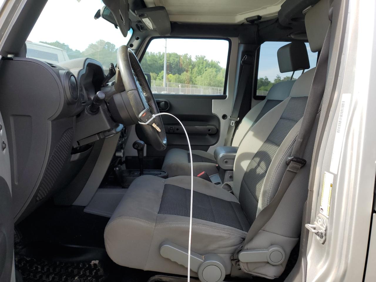 1J4BA3H1XAL112495 2010 Jeep Wrangler Unlimited Sport