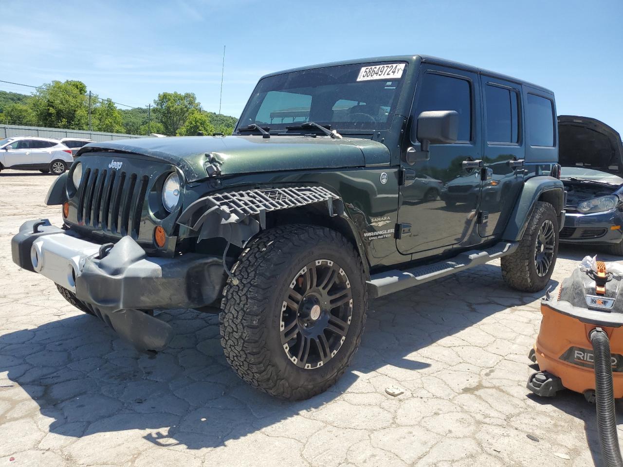 1J4BA5H19BL632233 2011 Jeep Wrangler Unlimited Sahara