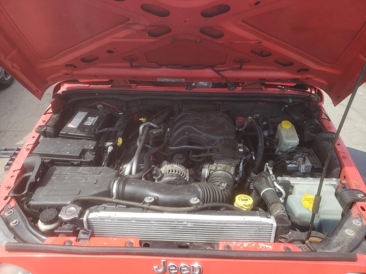 1C4HJWDG3DL623143 2013 Jeep Wrangler Unlimited Sport