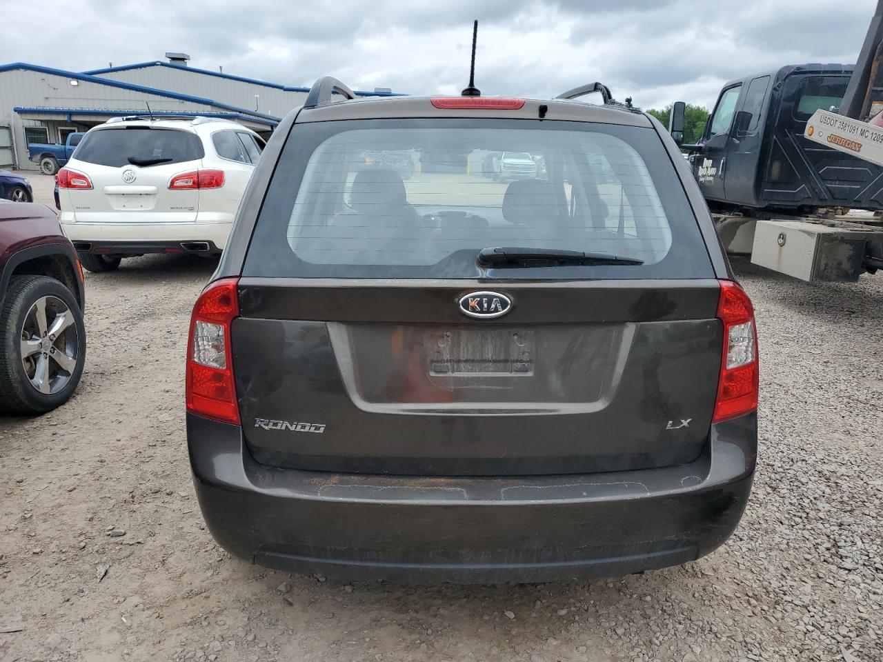 KNAFG528297235104 2009 Kia Rondo Base