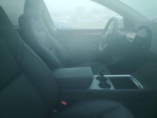 2023 Tesla Model Y VIN: 7SAYGAEE1PF894520 Lot: 57692674