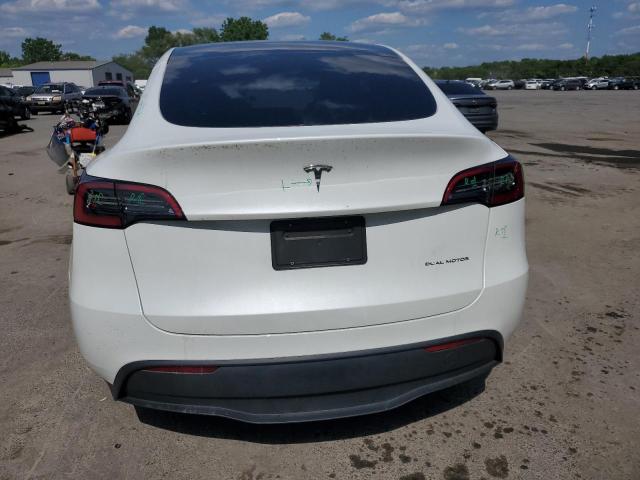 2023 Tesla Model Y VIN: 7SAYGDEE4PF662074 Lot: 58466584