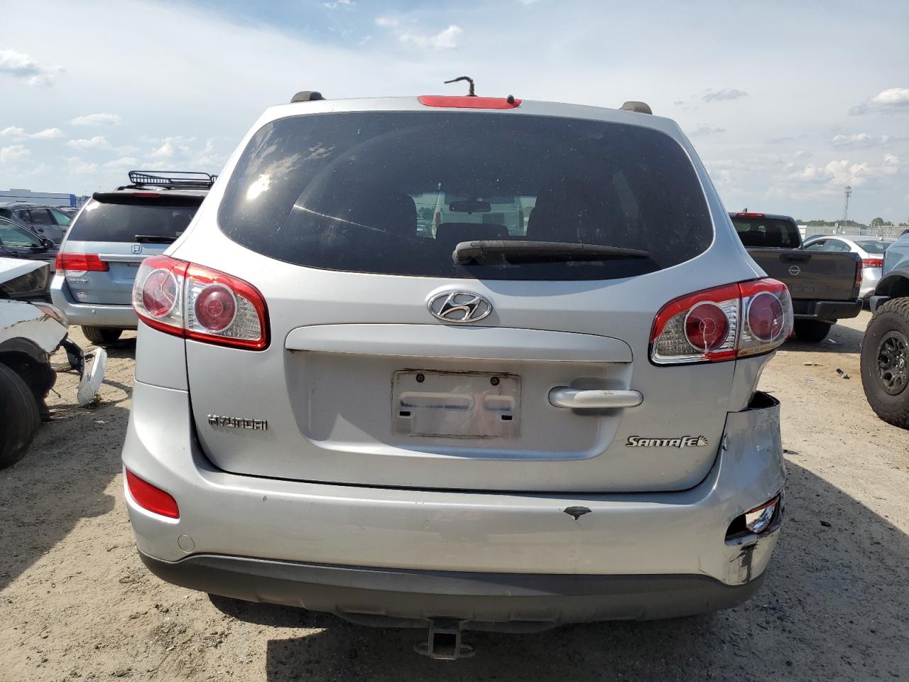 5NMSG3AB9AH344143 2010 Hyundai Santa Fe Gls