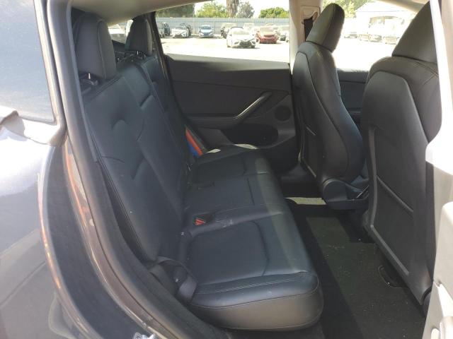 2023 Tesla Model Y VIN: 7SAYGDEE4PA037736 Lot: 60853354