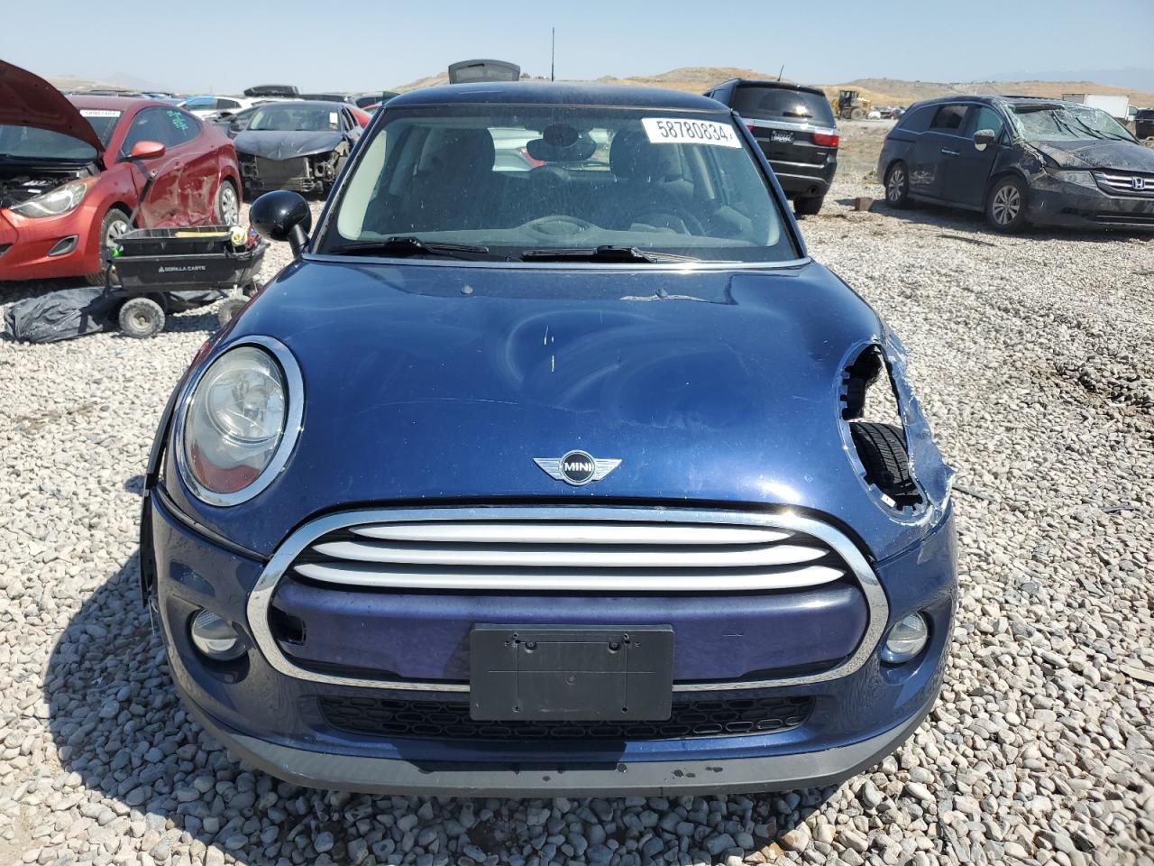 2015 Mini Cooper vin: WMWXM5C51F3B34322