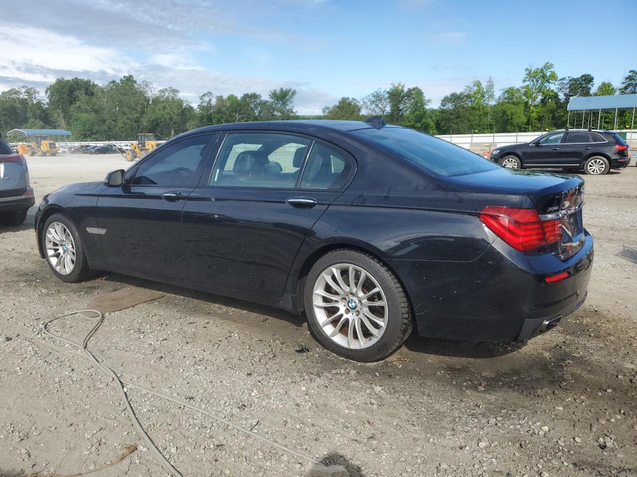 2014 BMW 750 Lxi vin: WBAYF8C58ED142536