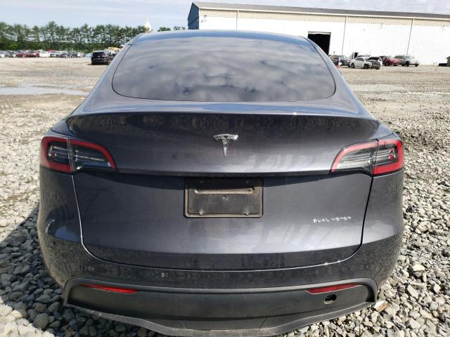 2023 Tesla Model Y VIN: 7SAYGAEE0PF661566 Lot: 58083234