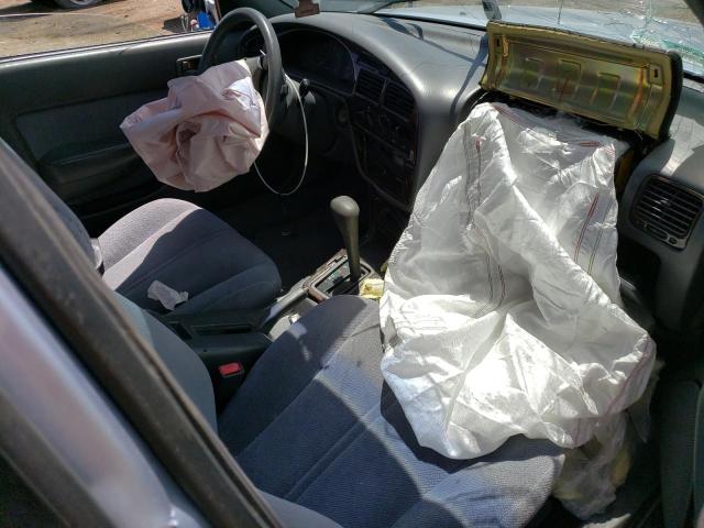 1995 Toyota Camry Le VIN: 4T1SK12E9SU628275 Lot: 57973524