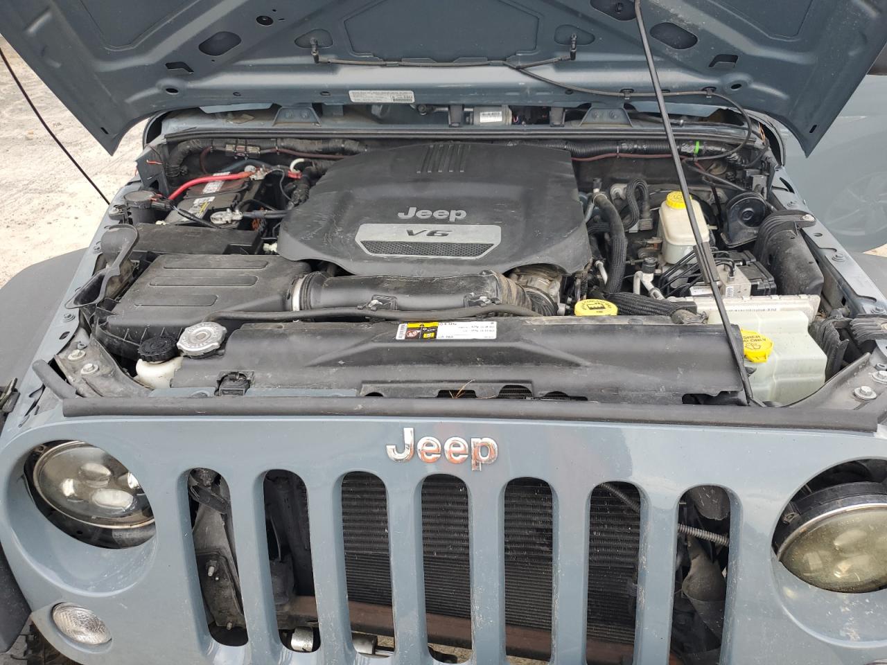 1C4HJWDG6EL313750 2014 Jeep Wrangler Unlimited Sport