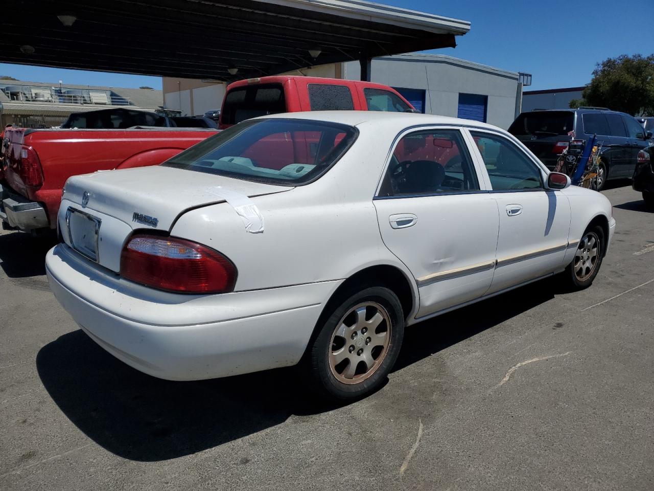 1YVGF22C525290025 2002 Mazda 626 Lx