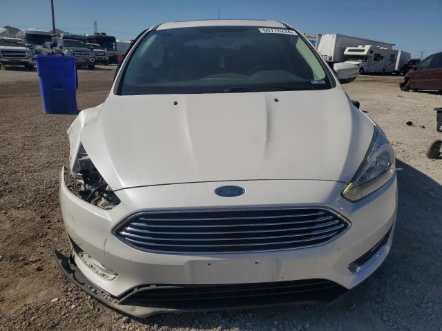 2017 Ford Focus Titanium VIN: 1FADP3N29HL299819 Lot: 60776224