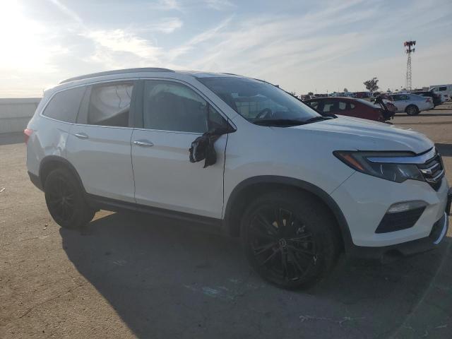 2017 HONDA PILOT TOUR 5FNYF5H99HB033643