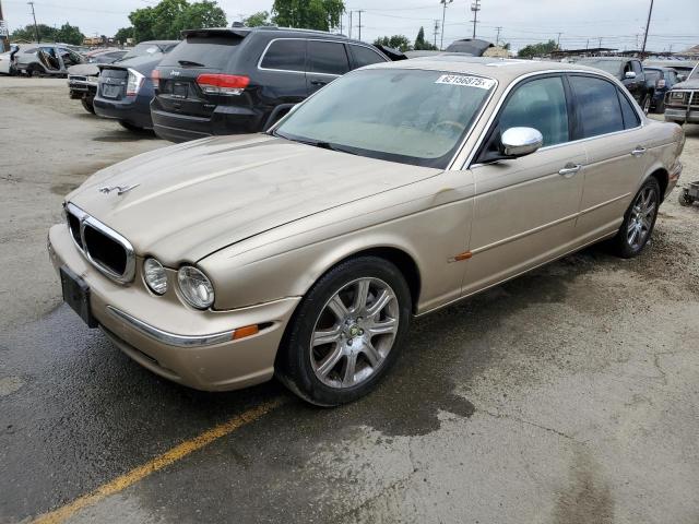 JAGUAR VANDENPLAS 2004 gold  gas SAJEA74C84SG03857 photo #1