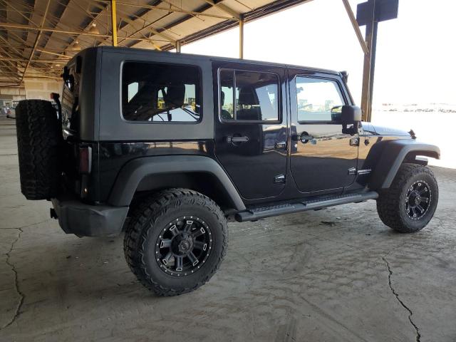JEEP WRANGLER U 2009 black 4dr spor gas 1J4GA69129L703342 photo #4