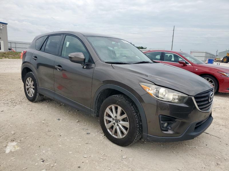 Vin: jm3ke4cy4g0660014, lot: 59597515, mazda cx-5 touring 20164