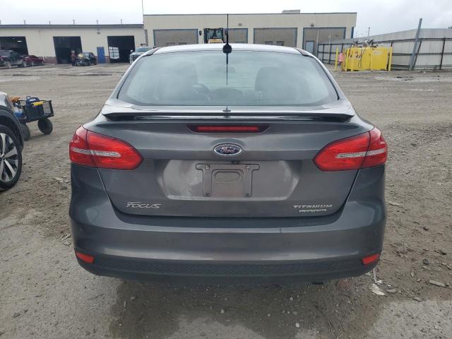 2015 FORD FOCUS TITA 1FADP3J21FL254702