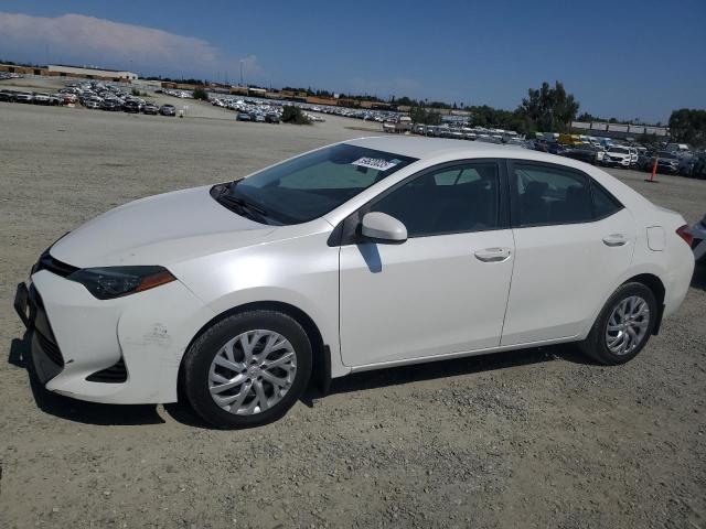 Vin: 5yfburhe9jp764597, lot: 59820035, toyota corolla l 2018 img_1