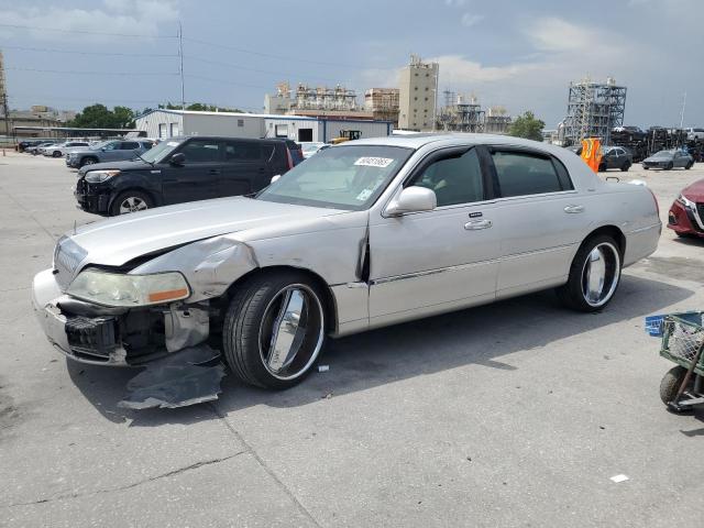 LINCOLN TOWN CAR U 2004 silver sedan 4d gas 1LNHM83WX4Y669062 photo #1