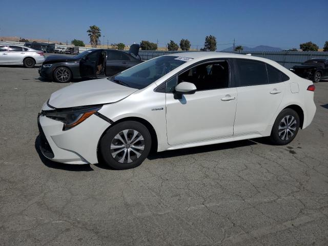 TOYOTA COROLLA LE 2020 white  hybrid engine JTDEBRBE2LJ026949 photo #1